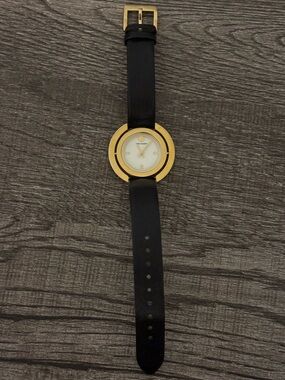Tory Burch Gold Round Face Watch with Black Leather Strap